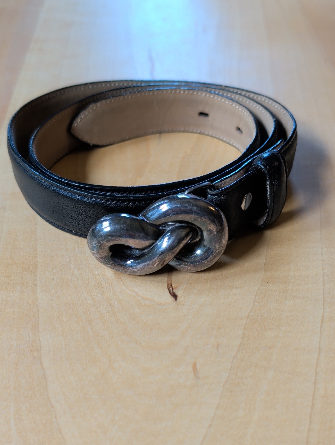Black Leather Women's Belt With Silver Interlocking Knot Buckle
